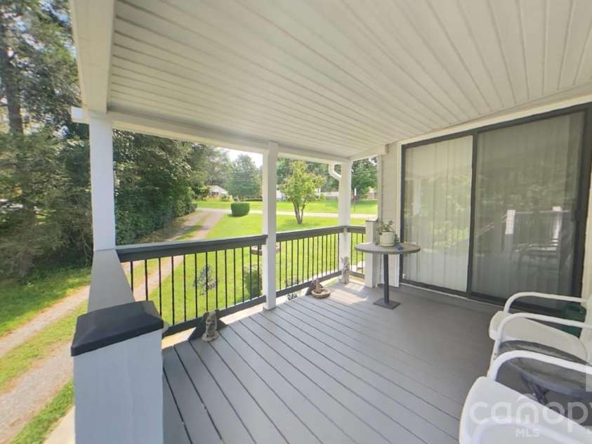 214 Governors View Road, Asheville, NC 28805.  MLS# CAR4413776, YatesRealty ID 44636. Covered Deck