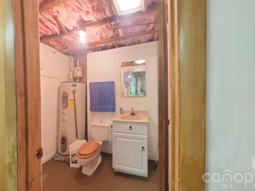 214 Governors View Road, Asheville, NC 28805.  MLS# CAR4413776, YatesRealty ID 44636. Half Bath in Basement