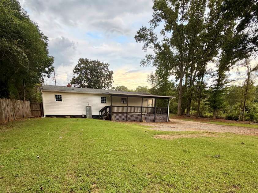 4709 Charlotte Highway, Lancaster, SC 29720.  MLS# CAR4397487, YatesRealty ID 44642. Large back deck