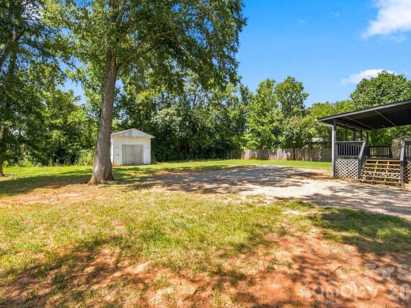 4709 Charlotte Highway, Lancaster, SC 29720.  MLS# CAR4397487, YatesRealty ID 44642. Level lot with workshop/shed