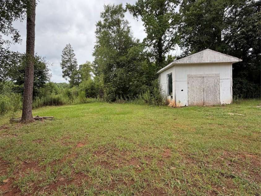 4709 Charlotte Highway, Lancaster, SC 29720.  MLS# CAR4397487, YatesRealty ID 44642. Right under half acre
