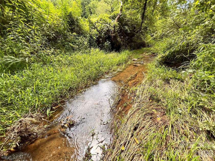 132 Hurd Road, Canton, NC 28716.  MLS# CAR4411733, YatesRealty ID 44644. Excellent water source for livestock or irrigation
