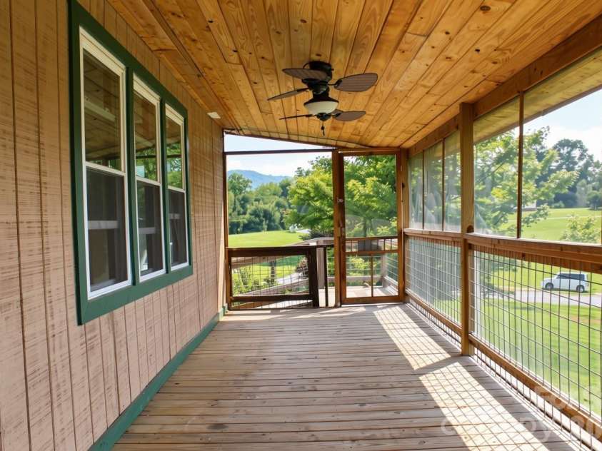 24 Karis Lane, Clyde, NC 28721.  MLS# CAR4414971, YatesRealty ID 44655. Front porch