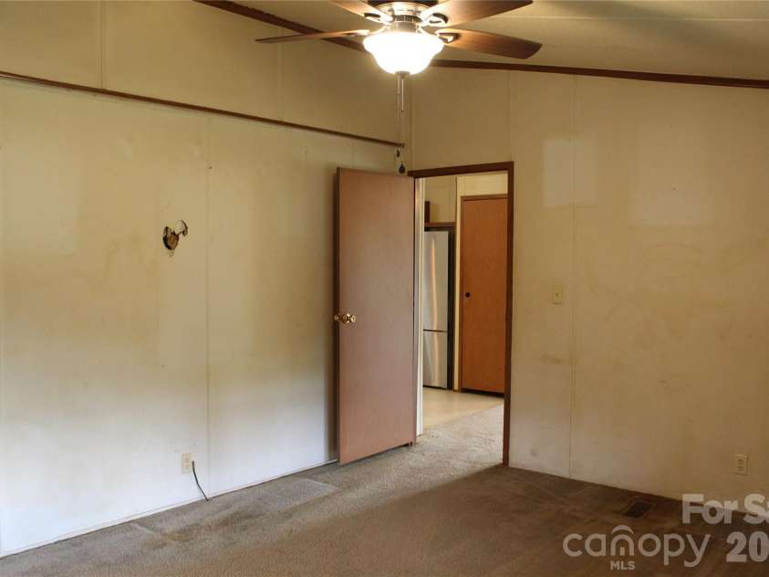 24 Karis Lane, Clyde, NC 28721.  MLS# CAR4414971, YatesRealty ID 44655. Primary bedroom