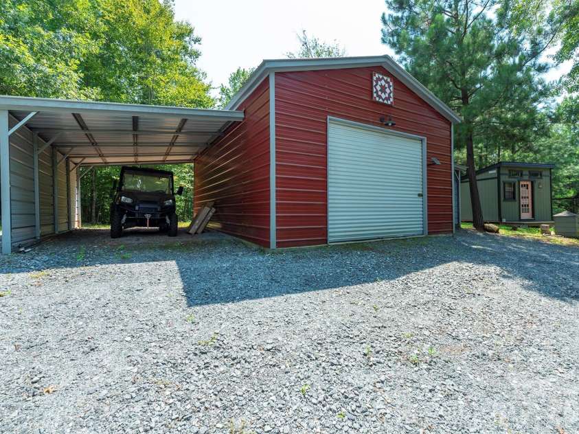 4895 Hudlow Road, Union Mills, NC 28167.  MLS# CAR4414979, YatesRealty ID 44656. Garage with side covered parking