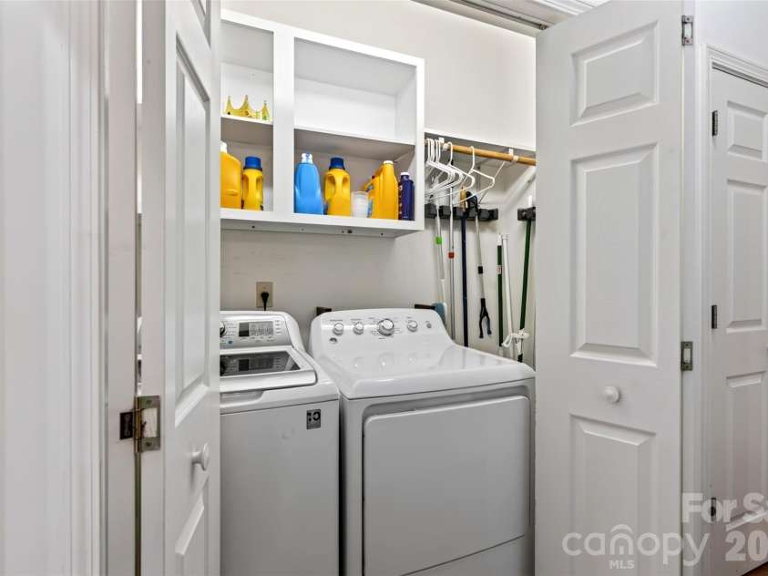 16 Spring Hollow Circle, Asheville, NC 28805.  MLS# CAR4412401, YatesRealty ID 44657. Convenient laundry closet.