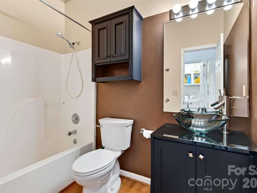 16 Spring Hollow Circle, Asheville, NC 28805.  MLS# CAR4412401, YatesRealty ID 44657. Full guest bathroom.