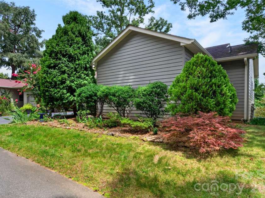 16 Spring Hollow Circle, Asheville, NC 28805.  MLS# CAR4412401, YatesRealty ID 44657. Side view from Spring Hollow Circle.