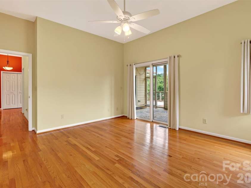 16 Spring Hollow Circle, Asheville, NC 28805.  MLS# CAR4412401, YatesRealty ID 44657. Spacious primary suite with high ceilings.