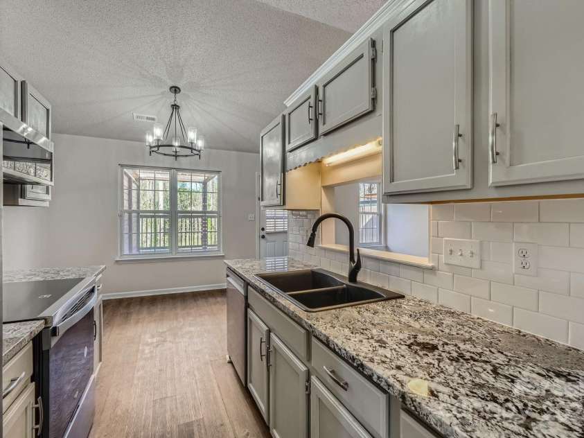 3753 Capps Hill Drive, Charlotte, NC 28216.  MLS# CAR4240768, YatesRealty ID 4466. 