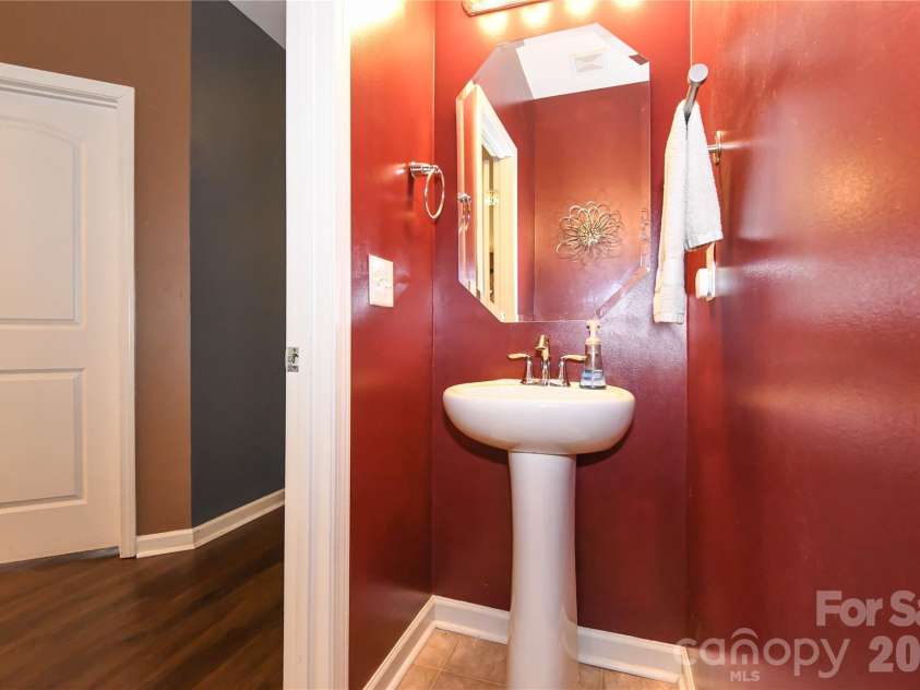 5149 Red Poll Drive, Greensboro, NC 27405.  MLS# CAR4411015, YatesRealty ID 44660. Half Bathroom