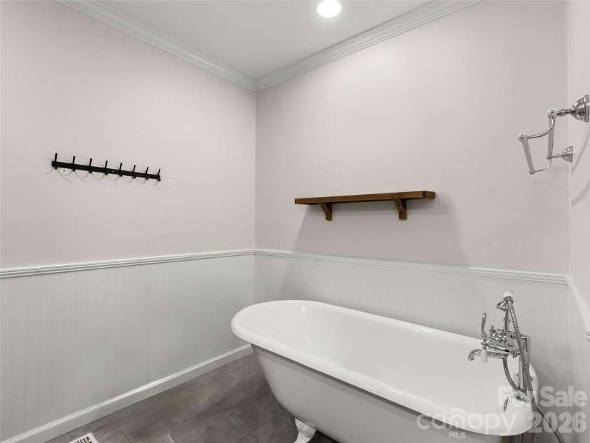 310 Case Street, Columbus, NC 28722.  MLS# CAR4371451, YatesRealty ID 44667. Primary soaking tub