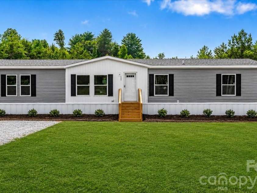 2309 Swanson Road, Crouse, NC 28033.  MLS# CAR4408709, YatesRealty ID 44673. AI / Photography Shop Generated Front Scape.