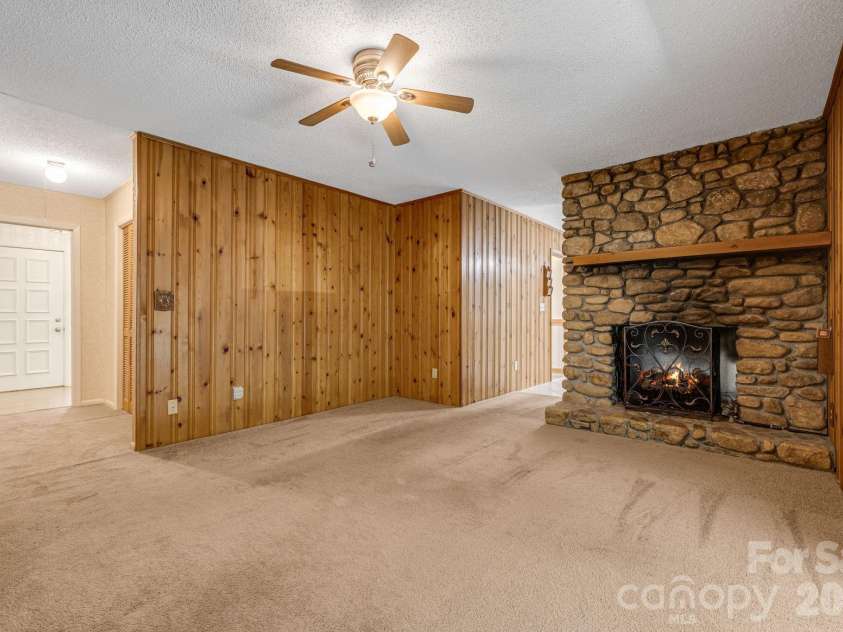 11 Ridgeway Drive, Weaverville, NC 28787.  MLS# CAR4414965, YatesRealty ID 44696. Den looking towards front doorn