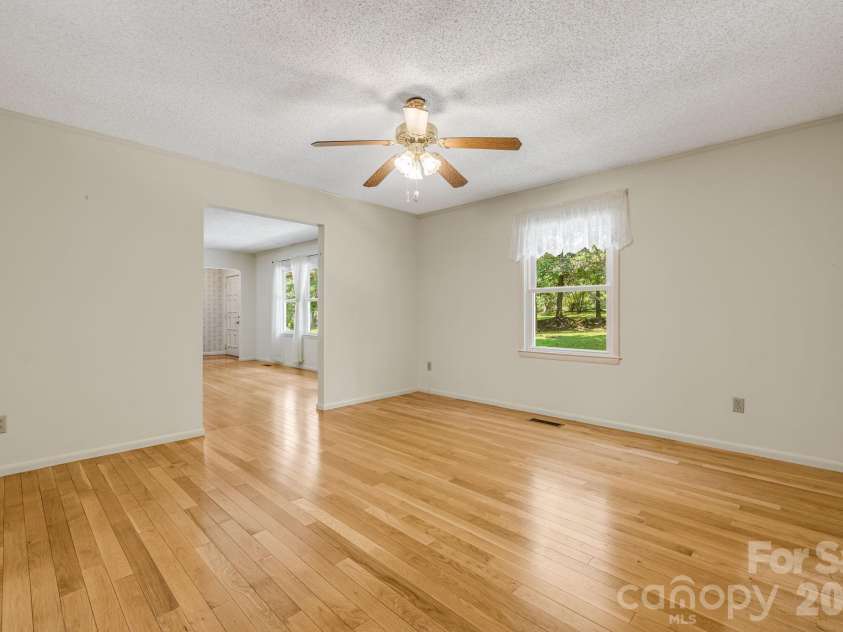 11 Ridgeway Drive, Weaverville, NC 28787.  MLS# CAR4414965, YatesRealty ID 44696. Dining Room looking into Living Room