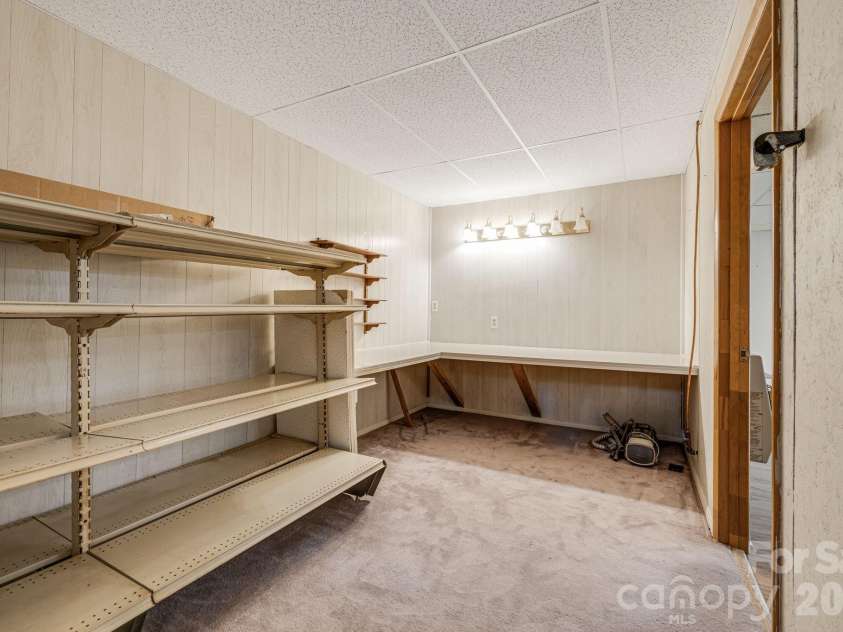 11 Ridgeway Drive, Weaverville, NC 28787.  MLS# CAR4414965, YatesRealty ID 44696. Hobby Room in Basement
