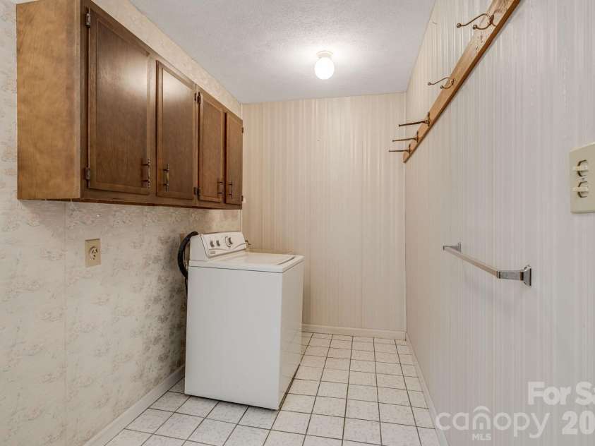11 Ridgeway Drive, Weaverville, NC 28787.  MLS# CAR4414965, YatesRealty ID 44696. Laundry in Basement