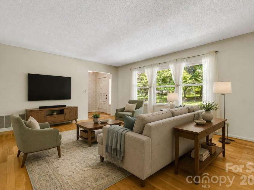 11 Ridgeway Drive, Weaverville, NC 28787.  MLS# CAR4414965, YatesRealty ID 44696. Living Room Virtually Staged