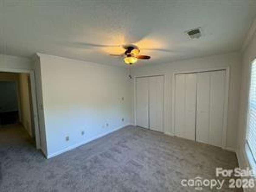 6049 Treetop Court, Charlotte, NC 28212.  MLS# CAR4397457, YatesRealty ID 44700. Second bedroom