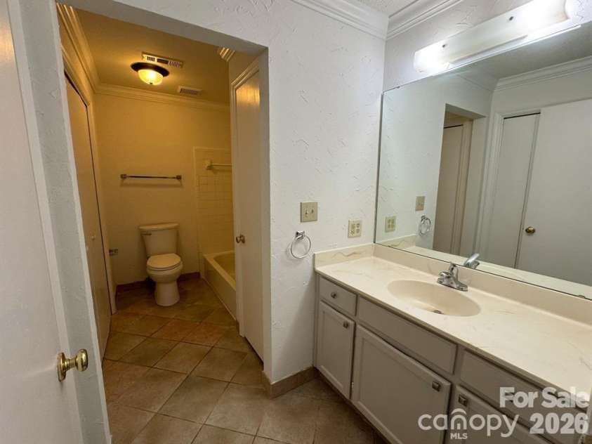 6049 Treetop Court, Charlotte, NC 28212.  MLS# CAR4397457, YatesRealty ID 44700. Secondary bath