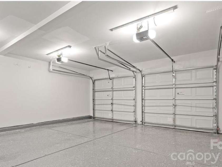 19300 Kanawha Drive, Cornelius, NC 28031.  MLS# CAR4414976, YatesRealty ID 44710. Garage with epoxy floors