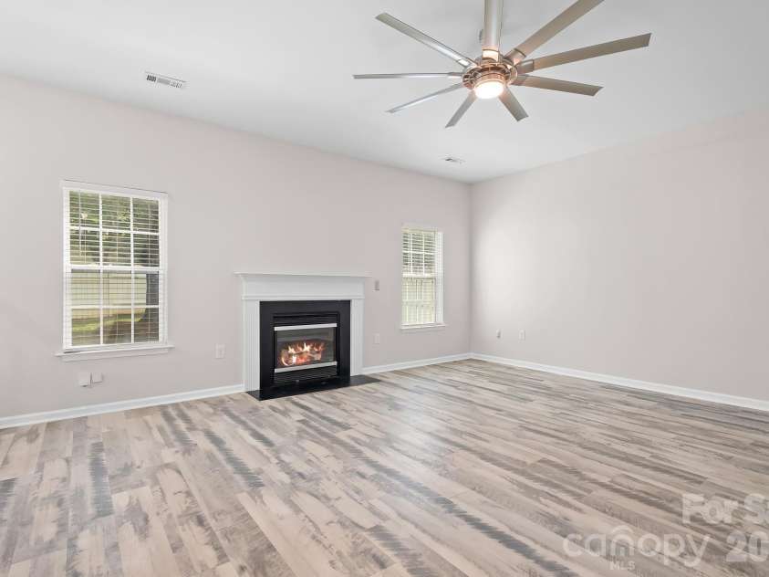 19300 Kanawha Drive, Cornelius, NC 28031.  MLS# CAR4414976, YatesRealty ID 44710. LVP flooring, updated lighting, fresh neutral paint