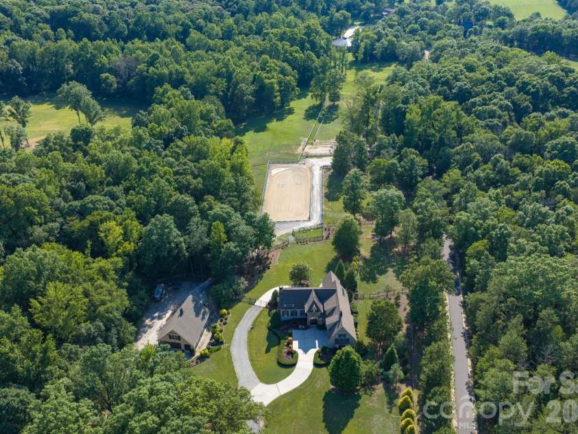 8528 Waxhaw Creek Road, Waxhaw, NC 28173.  MLS# CAR4393838, YatesRealty ID 44712. Current owners graded and cleared additional pasture area, installed extensive drainage systems and drive to new barn