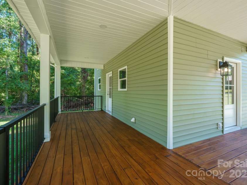 7589 Katherine Drive, Denver, NC 28037.  MLS# CAR4311633, YatesRealty ID 44729. Back and side porch