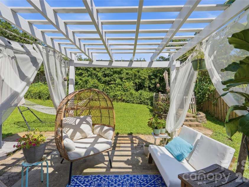 2925 Deep Cove Drive, Concord, NC 28027.  MLS# CAR4413532, YatesRealty ID 44732. Beautiful backyyard escpape under a gazebo