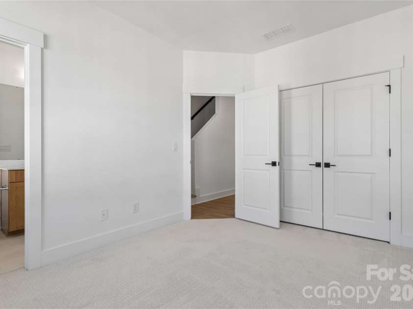 5013 Dutchess Drive, Charlotte, NC 28217.  MLS# CAR4407841, YatesRealty ID 44742. Guest suite 1