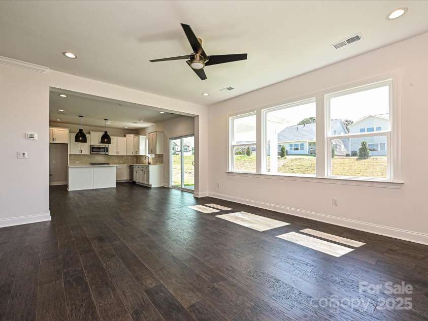 102 Cartington Way, Mooresville, NC 28115.  MLS# CAR4264361, YatesRealty ID 4475. Family Room/Dining/Kitchen