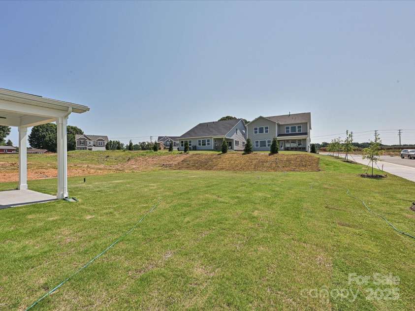 102 Cartington Way, Mooresville, NC 28115.  MLS# CAR4264361, YatesRealty ID 4475. Rear Yard