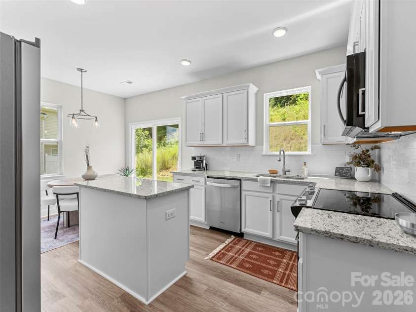16 Bessie Luther Boulevard, Candler, NC 28715.  MLS# CAR4409975, YatesRealty ID 44750. 
