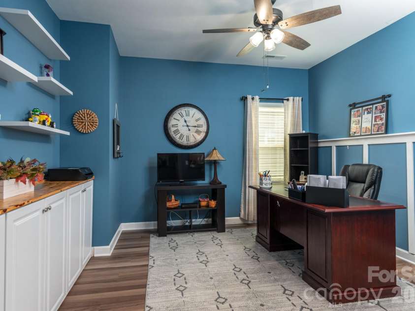 5134 Turtle Creek Drive, Denver, NC 28037.  MLS# CAR4415062, YatesRealty ID 44758. Large study/flex space with built in and floating shelves.