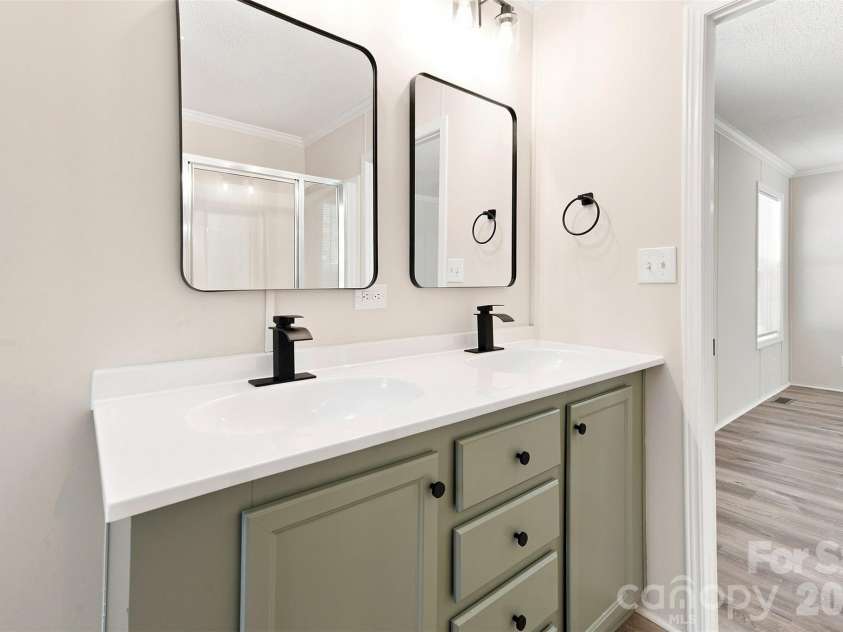 262 Upper Stanley Road, Stanley, NC 28164.  MLS# CAR4413693, YatesRealty ID 44776. Double sink in Primary Ensuite Bathroom.