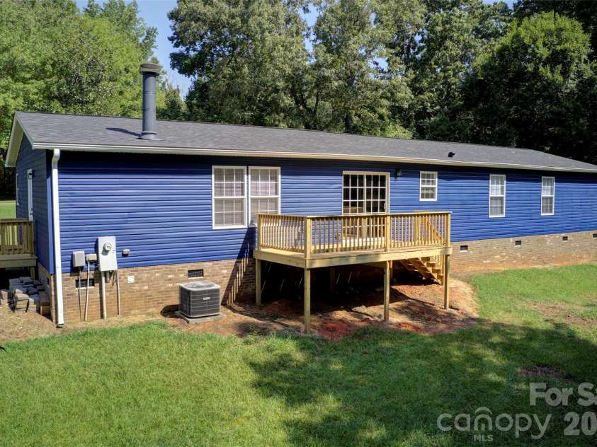 262 Upper Stanley Road, Stanley, NC 28164.  MLS# CAR4413693, YatesRealty ID 44776. Exterior back deck