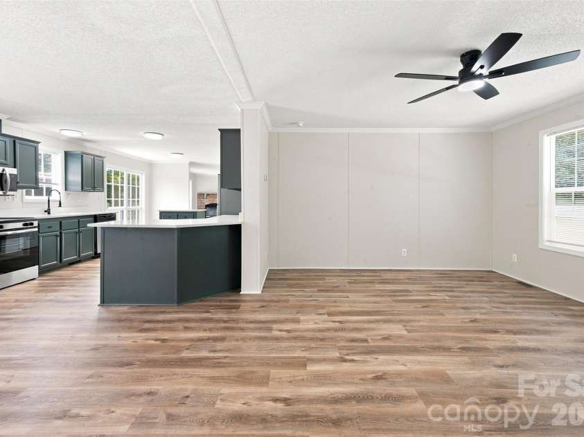 262 Upper Stanley Road, Stanley, NC 28164.  MLS# CAR4413693, YatesRealty ID 44776. Open floorplan from Great Room/Dining Room/Kitchen