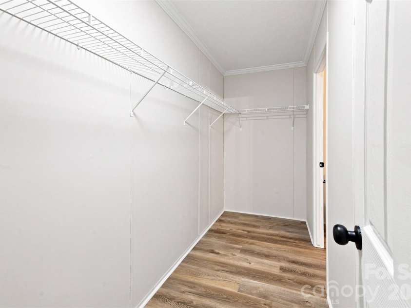 262 Upper Stanley Road, Stanley, NC 28164.  MLS# CAR4413693, YatesRealty ID 44776. Primary Bedroom has large walk-in closet.