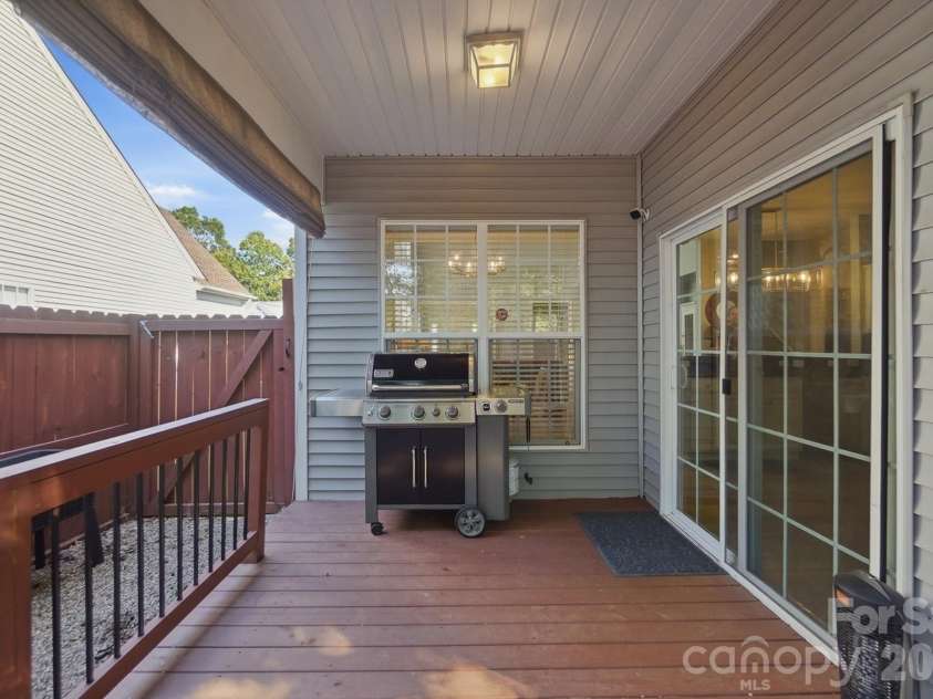 8530 Heron Glen Drive, Charlotte, NC 28269.  MLS# CAR4410893, YatesRealty ID 44779. Covered Deck