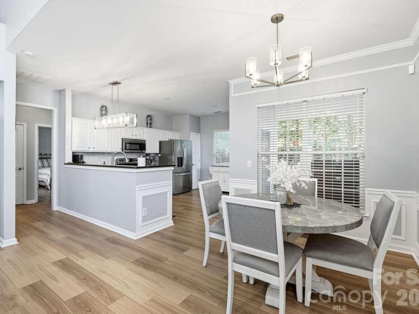 8530 Heron Glen Drive, Charlotte, NC 28269.  MLS# CAR4410893, YatesRealty ID 44779. Kitchen & Dining