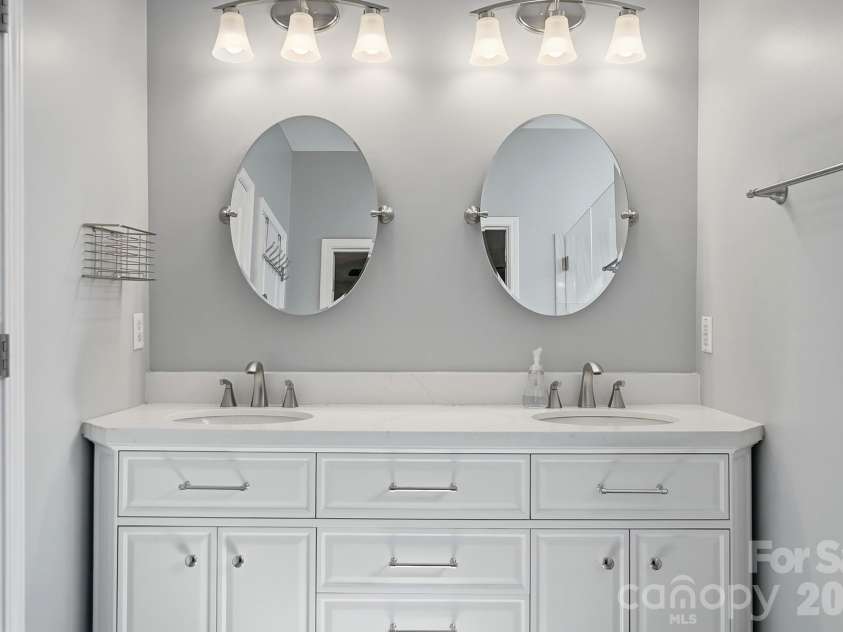 8530 Heron Glen Drive, Charlotte, NC 28269.  MLS# CAR4410893, YatesRealty ID 44779. Primary Vanity