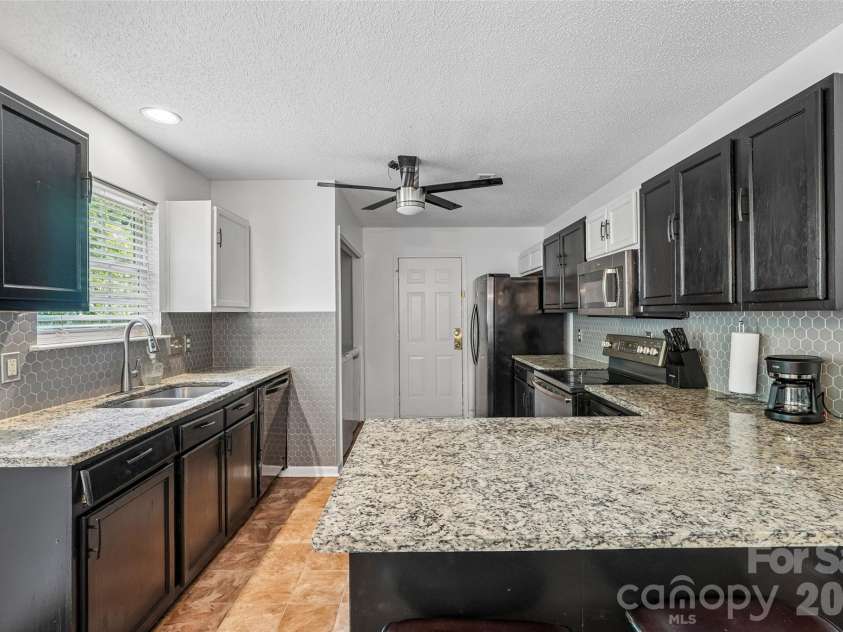 4926 Elizabeth Road, Charlotte, NC 28269.  MLS# CAR4415121, YatesRealty ID 44782. 