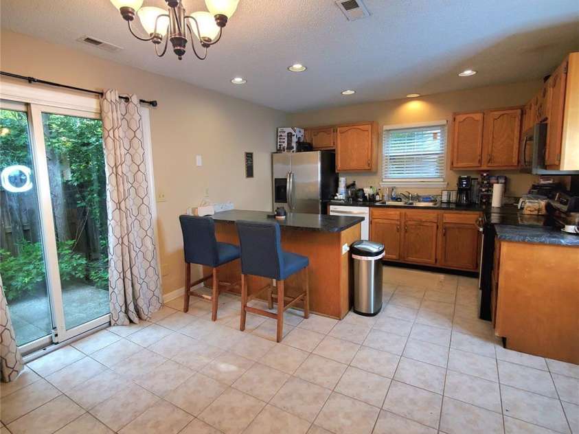3840 Mosscroft Lane, Charlotte, NC 28215.  MLS# CAR4415146, YatesRealty ID 44783. Kitchen.  Very open