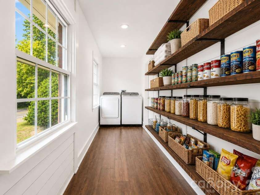 581 Old Leicester Highway, Asheville, NC 28806.  MLS# CAR4413183, YatesRealty ID 44785. Extra-long walk in pantry and convenient main-level laundry provide exceptional everyday storage and functionality.
