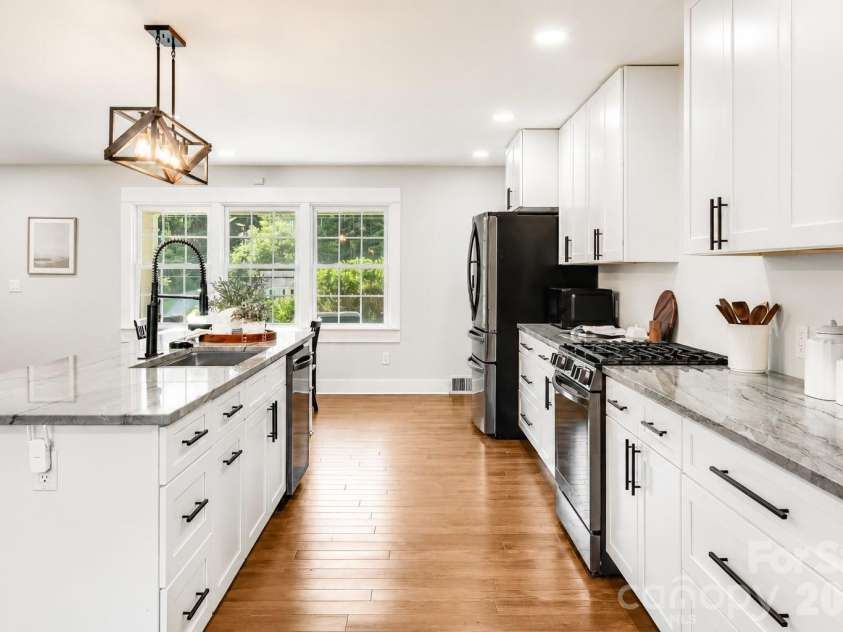581 Old Leicester Highway, Asheville, NC 28806.  MLS# CAR4413183, YatesRealty ID 44785. Spacious kitchen with extensive counter space, excellent storage and a functional layout.