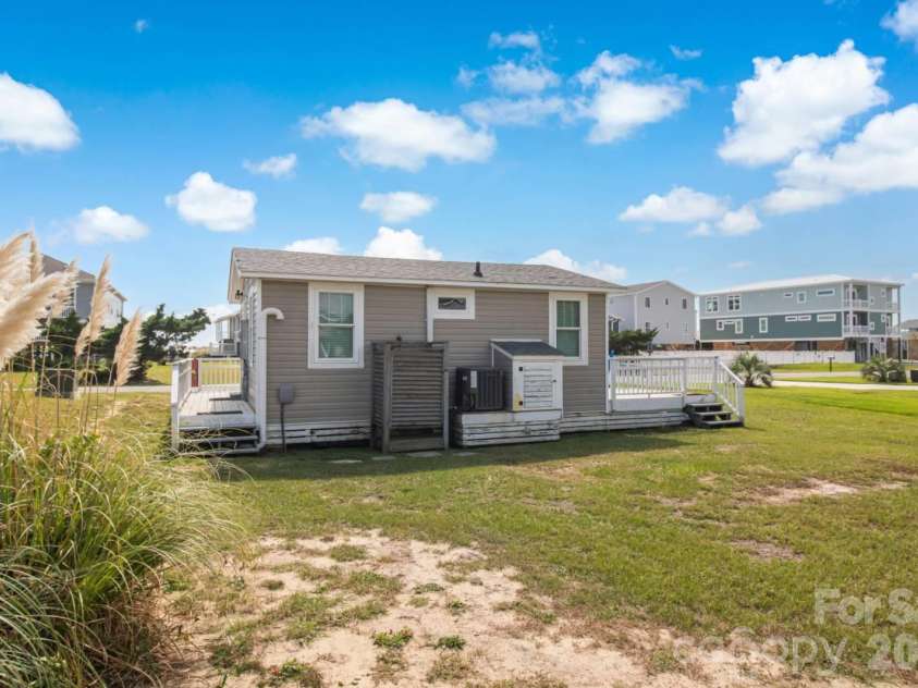 2622 Dolphin Drive, Oak Island, NC 28465.  MLS# CAR4415203, YatesRealty ID 44790. 