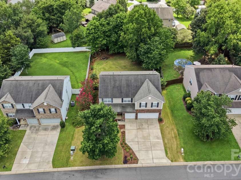 411 Moonshadow Haven, York, SC 29745.  MLS# CAR4414370, YatesRealty ID 44793. Middle home is 411 Moonshadow Haven!
