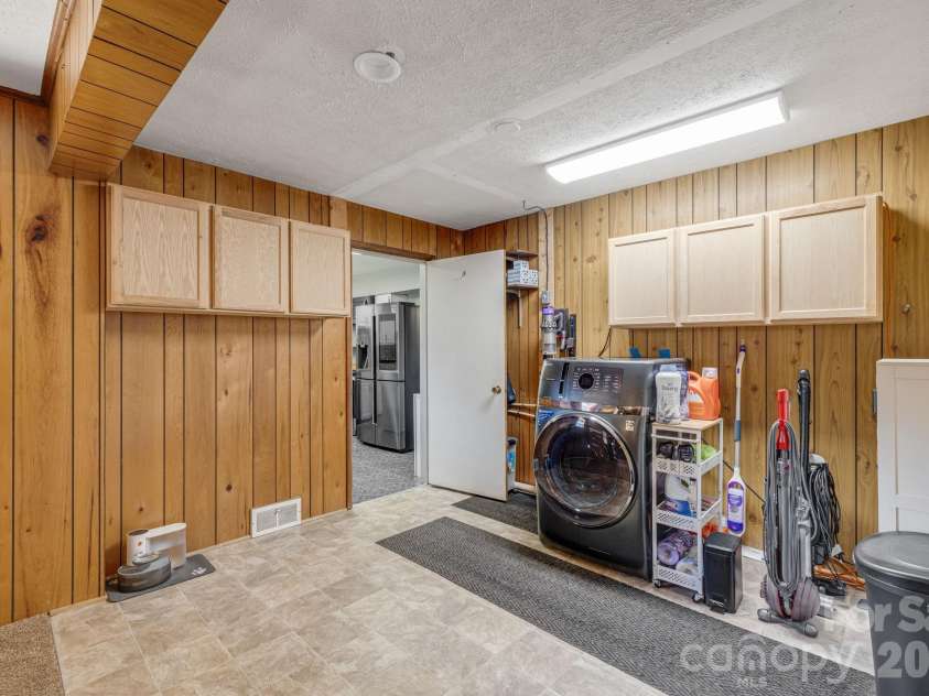 376 School Road, Asheville, NC 28803.  MLS# CAR4421506, YatesRealty ID 44798. Laundry off Kitchen