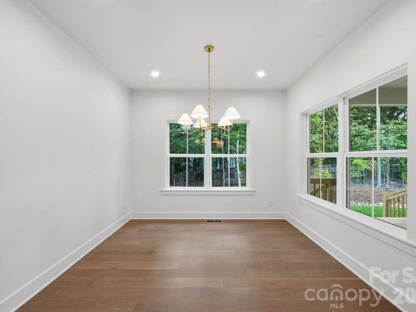 2311 Chateau Court, Matthews, NC 28105.  MLS# CAR4407256, YatesRealty ID 44799. Breakfast area.