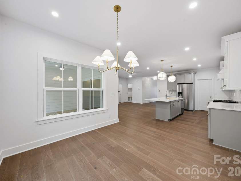 2311 Chateau Court, Matthews, NC 28105.  MLS# CAR4407256, YatesRealty ID 44799. Breakfast area.